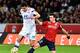 Lyon's French midfielder Yoann Gourcuff (L) vies for the ball with Lille's French defender Sebastien Corchia during the French L1 football match between Lille (LOSC) and Lyon (OL) on February 28, 2015 at the Pierre Mauroy Stadium in Villeneuve d'Ascq, nor