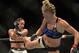 Holm's long-range kicks will be key.