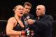 RIO DE JANEIRO, BRAZIL - AUGUST 01: (L-R) Ronda Rousey of the United States speaks to Joe Rogan after her knock out victory over Bethe Correia of Brazil in the first round in their UFC women's bantamweight championship bout during the UFC 190 event insid