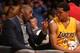 LOS ANGELES, CA - MARCH 10: Kobe Bryant #24 of the Los Angeles Lakers talks on the bench with Jordan Clarkson #6 during the game with the Detroit Pistons at Staples Center on March 10, 2015 in Los Angeles, California. NOTE TO USER: User expressly ack