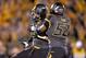 COLUMBIA, MO - OCTOBER 26: Defensive linemen Shane Ray #56 of the Missouri Tigers celebrates with teammate Michael Sam #52 after sacking quarterback Connor Shaw #14 of the South Carolina Gamecocks during the second half on October 26, 2013 at Faurot Fiel