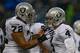 SEATTLE, WA - NOVEMBER 02: Quarterback Derek Carr #4 of the Oakland Raiders is checked on by tackle Donald Penn #72 after being sacked against the Seattle Seahawks at CenturyLink Field on November 2, 2014 in Seattle, Washington. The Seahawks defeated the