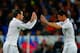 MADRID, SPAIN - NOVEMBER 04: Gareth Bale (L) of Real Madrid CF replaces team mate James Rodriguez (R) during the UEFA Champions League Group B match between Real Madrid CF and Liverpool FC at Estadio Santiago Bernabeu on November 4, 2014 in Madrid, Spain.