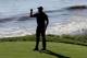 Aug 12, 2015; Sheboygan, WI, USA; Tiger Woods catches a golf ball on the 18th tee box during a practice round for the 2015 PGA Championship golf tournament at Whistling Straits -The Straits Course. Mandatory Credit: Brian Spurlock-USA TODAY Sports
