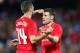 ADELAIDE, AUSTRALIA - JULY 20: James Milner (R) of Liverpool celebrates with Jordan Henderson (L) after scoring the first goal during the international friendly match between Adelaide United and Liverpool FC at Adelaide Oval on July 20, 2015 in Adelaide,