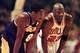 CHICAGO, UNITED STATES: Los Angeles Lakers guard Kobe Bryant(L) and Chicago Bulls guard Michael Jordan(R) talk during a free-throw attempt during the fourth quarter 17 December at the United Center in Chicago. Bryant, who is 19 and bypassed college baske