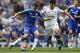 Chelsea's Brazilian midfielder Oscar (L) vies with Swansea City's South Korean midfielder Ki Sung-Yueng (R) during the English Premier League football match between Chelsea and Swansea City at Stamford Bridge in London on August 8, 2015. AFP PHOTO / ADRIA