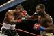 INGLEWOOD, CA - AUGUST 29: Shane Mosley throws a right hand at Ricardo Mayorga of Nicaragua at The Forum on August 29, 2015 in Inglewood, California. (Photo by Jeff Gross/Getty Images)