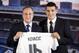 Real Madrid's new player Croatian Mateo Kovacic (R) and Real Madrid's president Florentino Perez hold Kovacic's new jersey during his official presentation at the Santiago Bernabeu stadium in Madrid on August 19, 2015. AFP PHOTO / DANI POZO (Photo