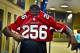 Gerald Christian dons his ceremonial Mr. Irrelevant jersey.