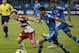 Aug 5, 2015; Montreal, Quebec, CAN; Montreal Impact midfielder Ignacio Piatti (10) and New York Red Bulls midfielder Dax McCarty (11) battle for the ball during the second half at Stade Saputo. Mandatory Credit: Eric Bolte-USA TODAY Sports