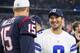 ARLINGTON, TX - SEPTEMBER 3: Tony Romo #9 of the Dallas Cowboys talks with Ryan Mallett #15 of the Houston Texans after a preseason game at AT&T Stadium on September 3, 2015 in Arlington, Texas. The Cowboys defeated the Texans 21-14. (Photo by Wesley H