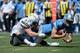 SAN DIEGO, CA - SEPTEMBER 13: Linebacker Kyle Emanuel #51 of the San Diego Chargers sacks quarterback Matthew Stafford #9 of the Detroit Lions at Qualcomm Stadium on September 13, 2015 in San Diego, California. (Photo by Donald Miralle/Getty Images)