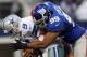 Chris Canty takes down Tony Romo, whom he started his career with.