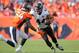 DENVER, CO - SEPTEMBER 13: Fullback Kyle Juszczyk #44 of the Baltimore Ravens rushes against outside linebacker Brandon Marshall #54 of the Denver Broncos in the third quarter of a game at Sports Authority Field at Mile High on September 13, 2015 in Denve