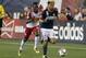 Sep 16, 2015; Foxborough, MA, USA; New York Red Bulls midfielder Lloyd Sam (10) chases down New England Revolution midfielder Lee Nguyen (24) during the second half at Gillette Stadium. Mandatory Credit: Stew Milne-USA TODAY Sports