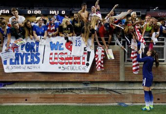 DETROIT, MI - SEPTEMBER 17: Alex Morgan #13 of the United States autographs for fans following the U.S. Women's 2015 World Cup victory tour match against Haiti at Ford Field on September 17, 2015, in Detroit, Michigan. The US defeated Haiti 5-0. (Photo by