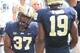 Sep 5, 2015; Pittsburgh, PA, USA; Pittsburgh Panthers running back Qadree Ollison (37) celebrates with wide receiver Dontez Ford (19) after scoring a seventy-one yard touchdown against the Youngstown State Penguinsduring the second half at Heinz Field. Th