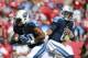 Sep 13, 2015; Tampa, FL, USA; Tennessee Titans quarterback Marcus Mariota (8) hands the ball off to running back Bishop Sankey (20) during the first quarter against the Tampa Bay Buccaneers at Raymond James Stadium. Mandatory Credit: Kim Klement-USA TODA