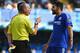 LONDON, ENGLAND - SEPTEMBER 19: Diego Costa of Chelsea is shown a yellow card by referee Mike Dean during the Barclays Premier League match between Chelsea and Arsenal at Stamford Bridge on September 19, 2015 in London, United Kingdom. (Photo by Ross Ki