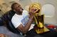 OAKLAND, CA - JUNE 17: Festus Ezeli #31 of the Golden State Warriors holds the trophy on the plane as the team travels home from Cleveland after winning the 2015 NBA Finals on June 17, 2015 in Oakland, California. NOTE TO USER: User expressly acknowledge