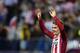 Atletico Madrid's French forward Antoine Griezmann celebrates after scoring a goal during the Spanish league football match Club Atletico de Madrid vs Getafe CF at the Vicente Calderon stadium in Madrid on September 22, 2015. AFP PHOTO/ JAVIER SORIANO