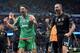 Juventus' goalkeeper from Italy Gianluigi Buffon (L) and Juventus' defender from Italy Leonardo Bonucci (R) celebrate after winning a UEFA Champions League group stage football match between Manchester City and Juventus at the Etihad stadium in Manchester