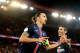 PARIS, FRANCE - SEPTEMBER 22: Zlatan Ibrahimovic of Paris Saint-Germain celebrate his gaol with Angel Di Maria during the French Ligue 1 between Paris Saint-Germain FC and EA Guingamp at Parc Des Princes on september 22, 2015 in Paris, France. (Photo b