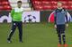 Dieter Hecking and Andre Schurrle during training on the Old Trafford pitch