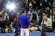 NEW YORK, NY - SEPTEMBER 13: Novak Djokovic of Serbia celebrates with the winner's trophy after defeating Roger Federer of Switzerland during their Men's Singles Final match on Day Fourteen of the 2015 US Open at the USTA Billie Jean King National Tennis