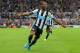 NEWCASTLE UPON TYNE, ENGLAND - SEPTEMBER 26: Georginio Wijnaldum of Newcastle United celebrates scoring his team's second goal with his team mates during the Barclays Premier League match between Newcastle United and Chelsea at St James' Park on Septembe
