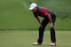 Oct 5, 2013; Dublin, OH, USA; Zach Johnson lines up a putt on the 17th green during the second round of the Presidents Cup at Muirfield Village Golf Club. Mandatory Credit: Allan Henry-USA TODAY Sports
