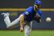 Oct 2, 2015; Milwaukee, WI, USA; Chicago Cubs pitcher Jake Arrieta (49) pitches in the first inning against the Milwaukee Brewers at Miller Park. Mandatory Credit: Benny Sieu-USA TODAY Sports