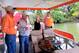 Caldwell (far right) sometimes entertains friends on his houseboat. (From left) Gary Moffatt, Len Johnson and Edna Johnson chat with Caldwell.