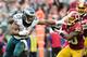LANDOVER, MD - OCTOBER 04: DeMarco Murray #29 of the Philadelphia Eagles breaks the tackle of Kyshoen Jarrett #30 of the Washington Redskins in the second quarter at FedExField on October 4, 2015 in Landover, Maryland. (Photo by Evan Habeeb/Getty Images)
