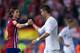 MADRID, SPAIN - OCTOBER 04: Cristiano Ronaldo (L) of Real Madrid CF shakes hands with Filipe Luis (L) of Atletico de Madrid as he leaves the pitch after the La Liga match between Club Atletico de Madrid and Real Madrid CF at Vicente Calderon Stadium on