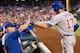 PHILADELPHIA, PA - SEPTEMBER 11: Manager Joe Maddon #70 of the Chicago Cubs high fives Kris Bryant #17 after a two-run homerun by Bryant in the top of the fifth inning against the Philadelphia Phillies on September 11, 2015 at Citizens Bank Park in Philad