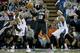 Oct 8, 2015; Sacramento, CA, USA; San Antonio Spurs forward LaMarcus Aldridge (12) dribbles the ball as Sacramento Kings center Willie Cauley-Stein (00) defends during the first quarter at Sleep Train Arena. Mandatory Credit: Kelley L Cox-USA TODAY Sports