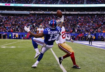 EAST RUTHERFORD, NJ - NOVEMBER 16:  Odell Beckham #13 makes a catch against  Perrish Cox #20 of the San Francisco 49ers in the fourth quarter of the New York Giants at MetLife Stadium on November 16, 2014 in East Rutherford, New Jersey.  (Photo by Elsa/Ge