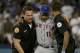 Ruben Tejada had to be helped onto the cart that was to take him from the field.