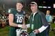 Gibson greets Michigan State quarterback Connor Cook during the Spartans' appearance in the 2014 Rose Bowl.
