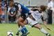 Sep 27, 2015; San Jose, CA, USA; Real Salt Lake midfielder Kyle Beckerman (5) pulls on the uniform of San Jose Earthquakes midfielder Anibal Godoy (30) during the second half at Avaya Stadium. The San Jose Earthquakes won 1-0. Mandatory Credit: Kelley L C
