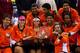 Members of the Indian Aces pose with the trophy from the 2014 IPTL season.