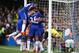 LONDON, ENGLAND - OCTOBER 17: Chelsea players celebrate their team's first goal by Diego Costa (obscured) during the Barclays Premier League match between Chelsea and Aston Villa at Stamford Bridge on October 17, 2015 in London, England. (Photo by Clive