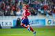 SAN SEBASTIAN, SPAIN - OCTOBER 18: Antoine Griezmann of Atletico de Madrid celebrates after scoring during the La Liga match between Real Sociedad de Futbol and Atletico de Madrid at Estadio Anoeta on October 18, 2015 in San Sebastian, Spain. (Photo by