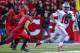 Oct 24, 2015; Piscataway, NJ, USA; Rutgers Scarlet Knights defensive back Anthony Cioffi (31) pursues Ohio State Buckeyes quarterback J.T. Barrett (16) during the first quarterat High Points Solutions Stadium. Mandatory Credit: Jim O'Connor-USA TODAY Spo