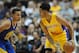 October 22, 2015; Anaheim, CA, USA; Los Angeles Lakers guard D'Angelo Russell (1) moves the ball against the defense of Golden State Warriors guard Stephen Curry (30) during the first half at Honda Center. Mandatory Credit: Gary A. Vasquez-USA TODAY Sport