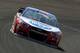 INDIANAPOLIS, IN - JULY 24: AJ Allmendinger, driver of the #47 Kroger/Kingsford Charcoal Chevrolet, practices for the NASCAR Sprint Cup Series Crown Royal Presents the Jeff Kyle 400 at the Brickyard at Indianapolis Motorspeedway on July 24, 2015 in India