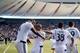 Mar 28, 2015; Vancouver, British Columbia, CAN; Vancouver Whitecaps FC defender Kendall Waston (4) and midfielder Robert Earnshaw (88) and defender Steven Beitashour (33) and midfielder Pedro Morales (77) and midfielder Kianz Froese (38) celebrate Earnsha