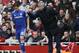 Chelsea's Portuguese manager Jose Mourinho (R) speaks with Chelsea's Belgian midfielder Eden Hazard during the English Premier League football match between Arsenal and Chelsea at the Emirates Stadium in London on April 26, 2015.
AFP PHOTO / ADRIAN DENNIS